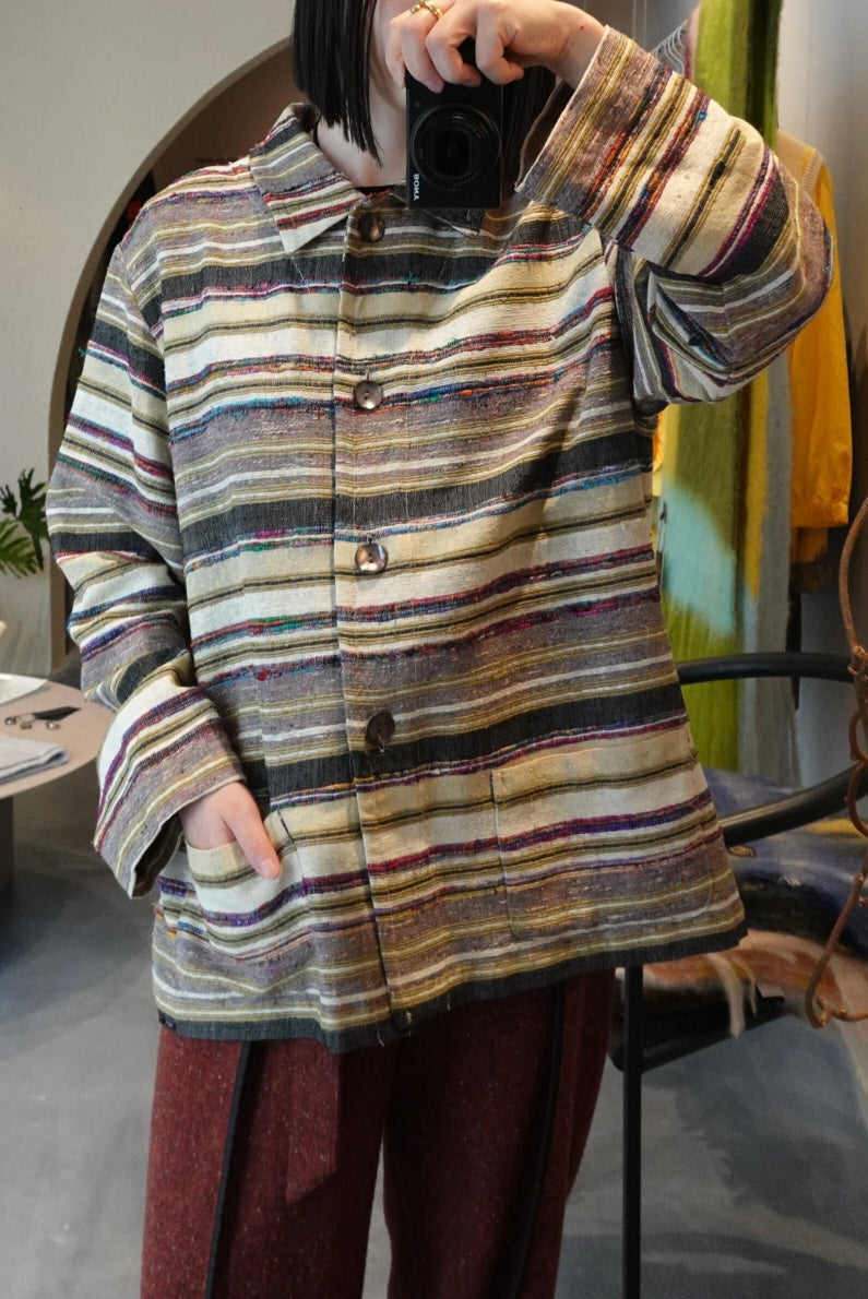 Silk woven jacket with black lip pearl oyster buttons