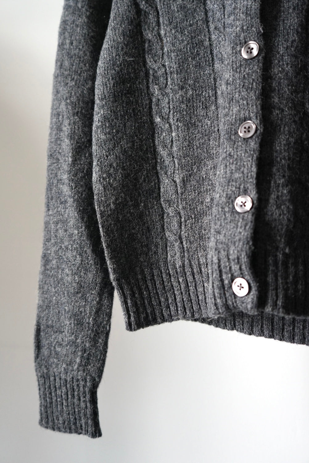 Collarless wool cardigan