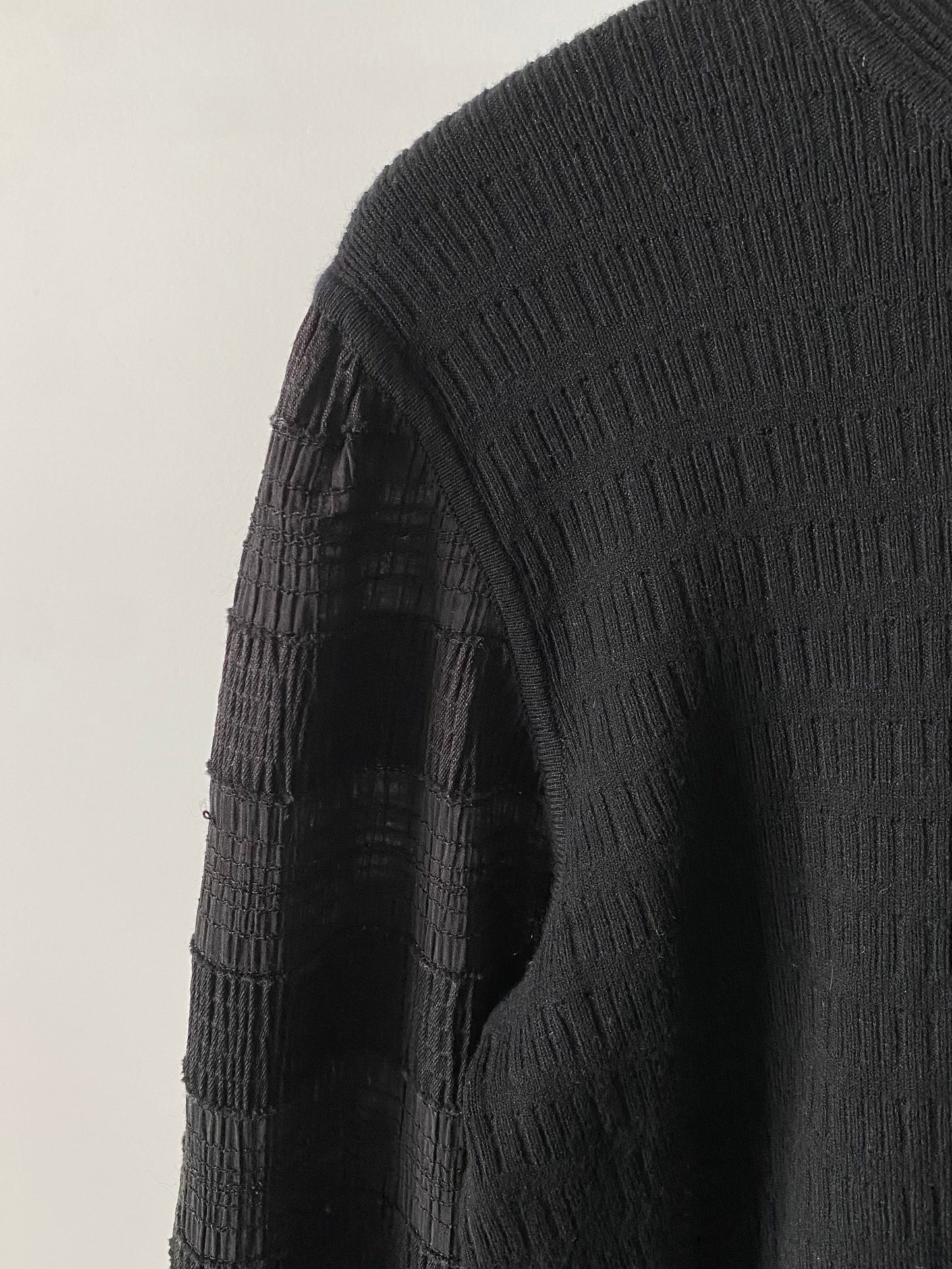 Sheer sleeve combination knit