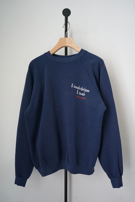 "I touch the future I teach" sweat