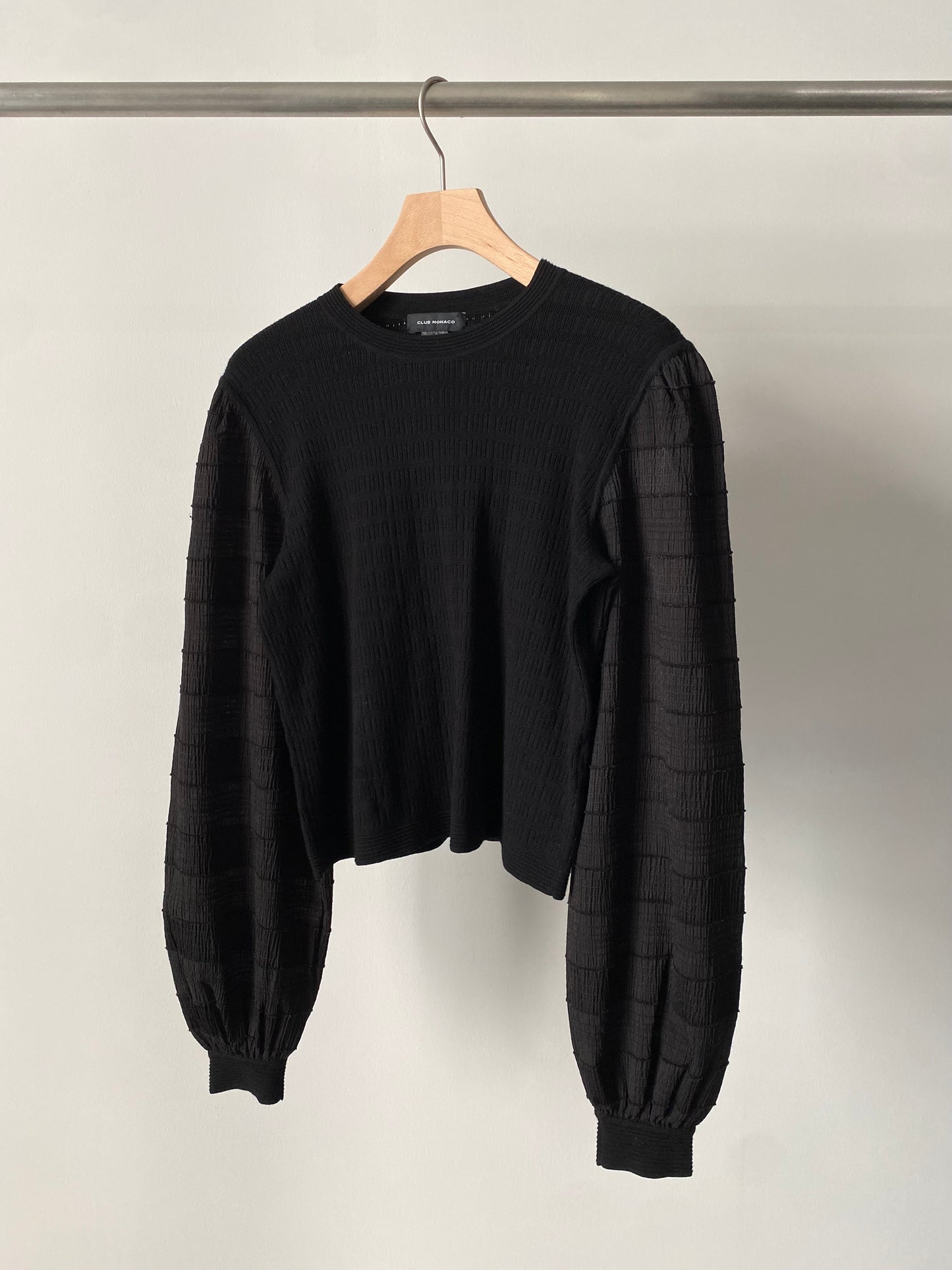 Sheer sleeve combination knit