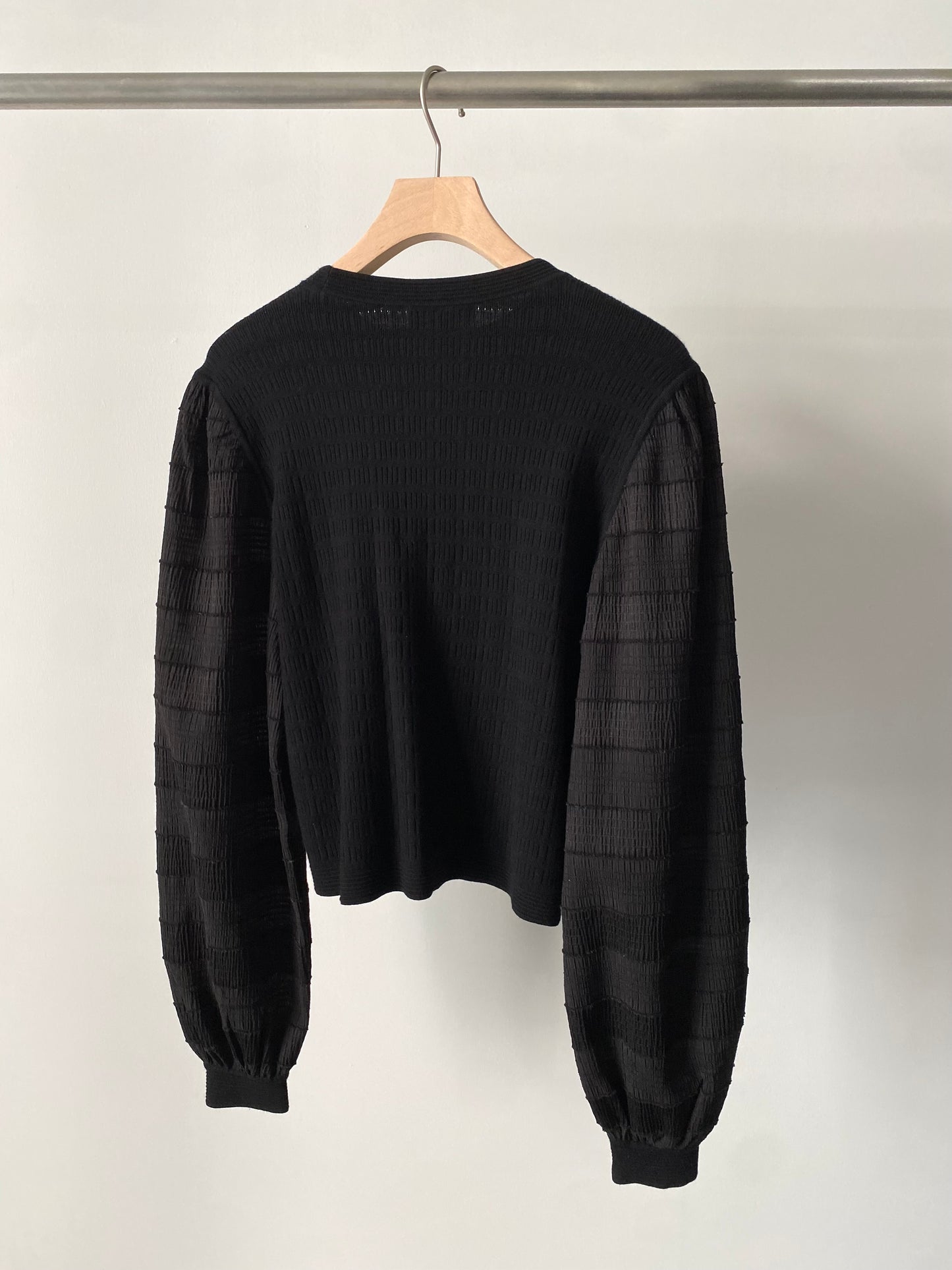 Sheer sleeve combination knit