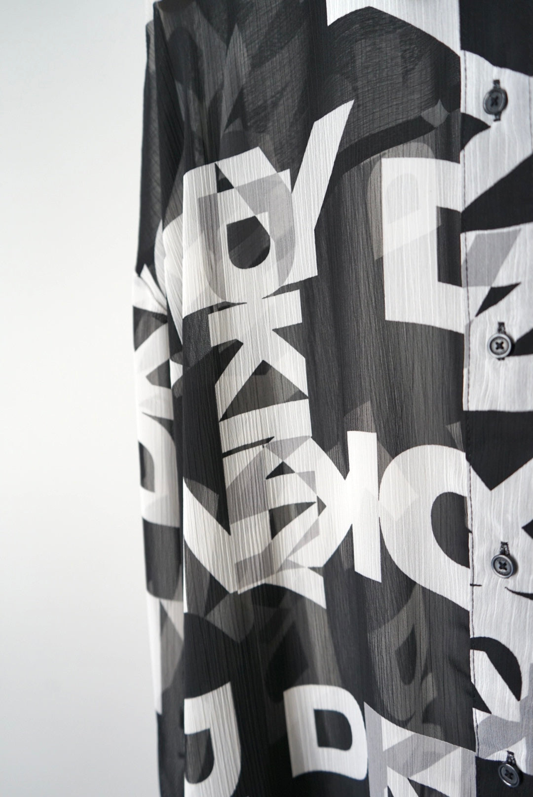 Designer's logo sheer shirts