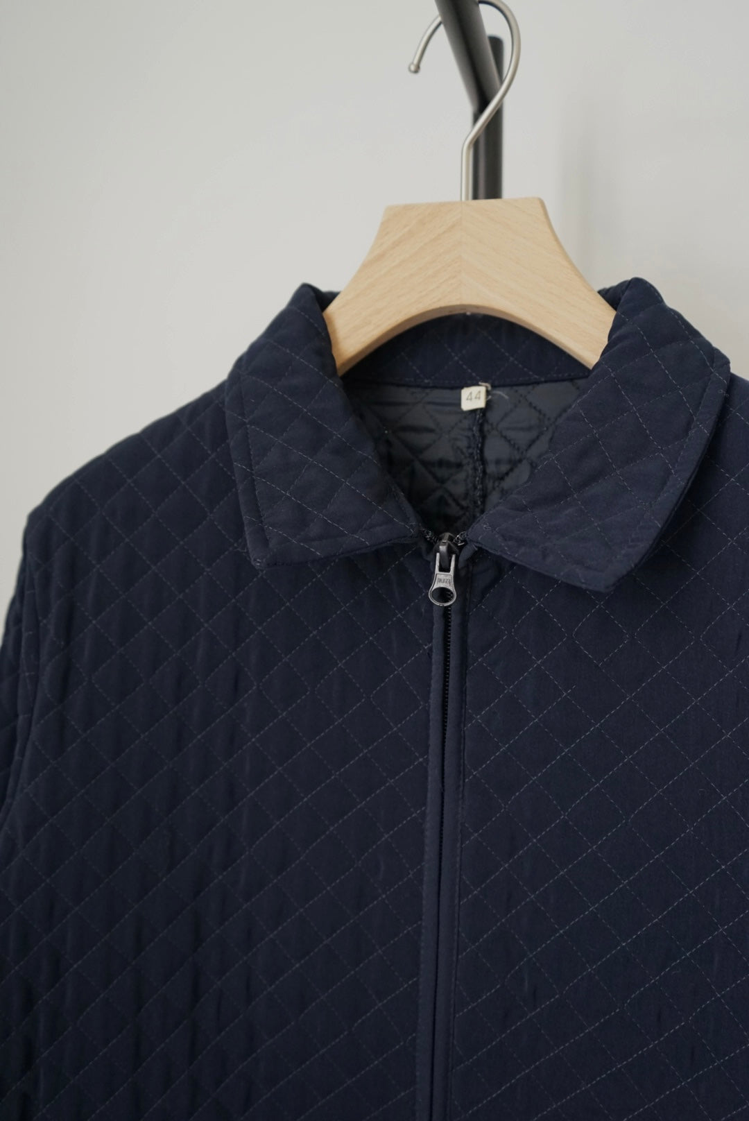 Navy zip-up quilted jacket made in Italy