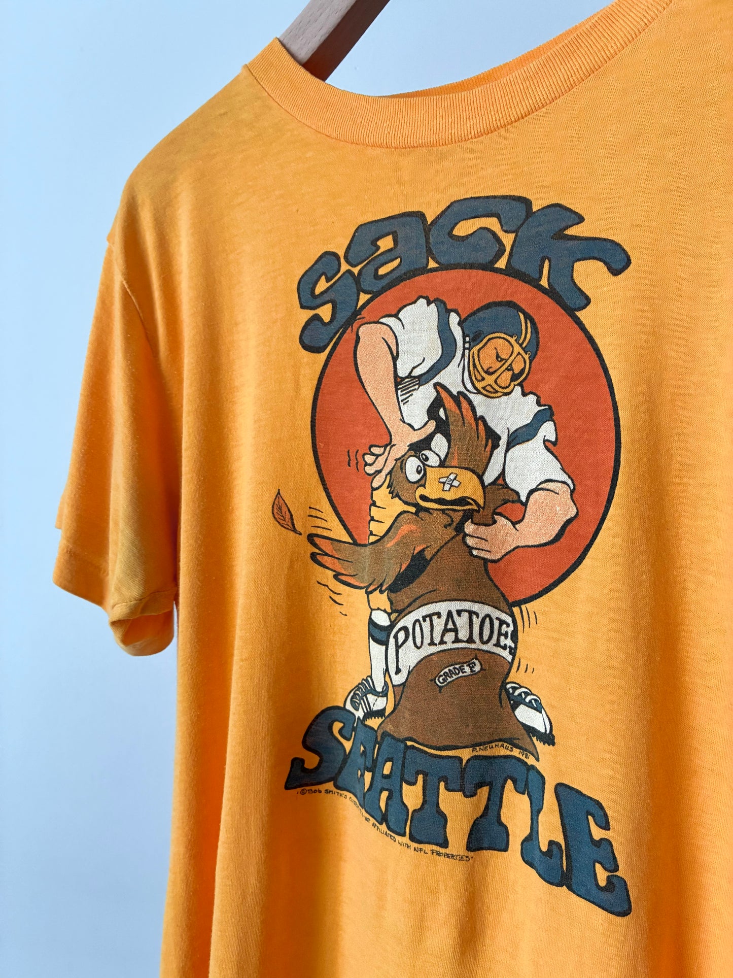 "Sack by P.NEUHAUS" print tee