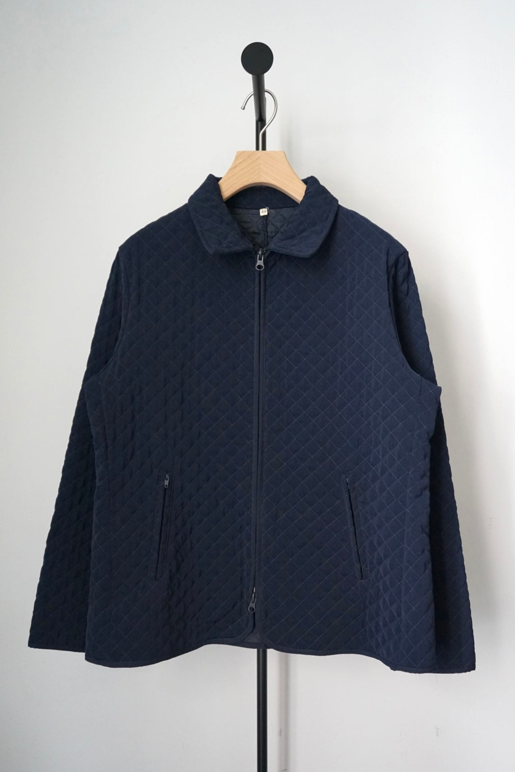Navy zip-up quilted jacket made in Italy